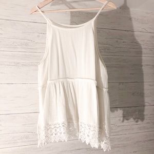 Peplum tank top with lace trim